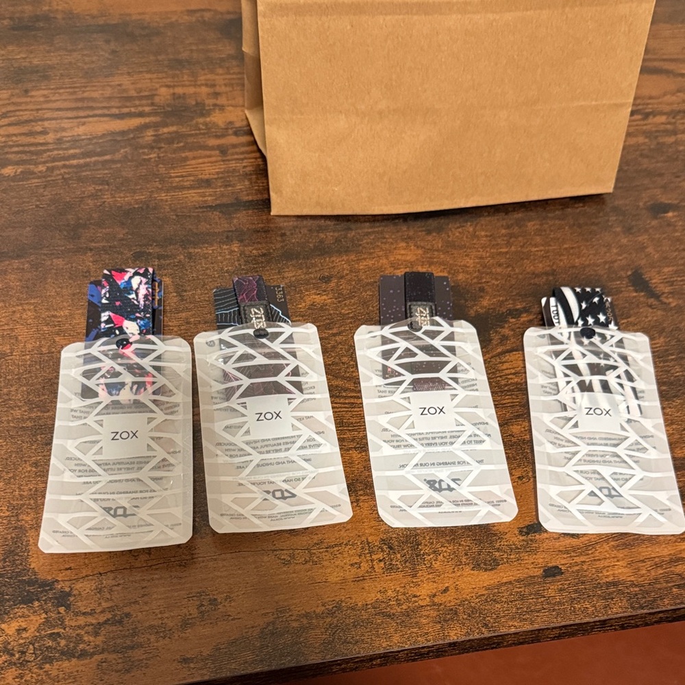 4 ZOX Black and Multicolor Wristbands - NWOT